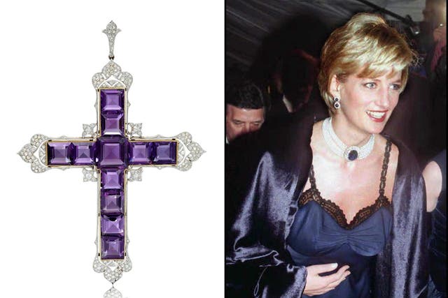 <p>The Garrard crucifix pendant, worn by Diana, Princess of Wales, several times throughout her life, will go on auction</p>