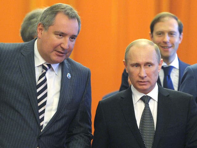 <p>File photo: Dmitry Rogozin (left) with Vladimir Putin on a diplomatic trip to Beijing in 2012</p>