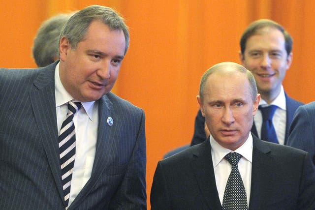 <p>File photo: Dmitry Rogozin (left) with Vladimir Putin on a diplomatic trip to Beijing in 2012</p>