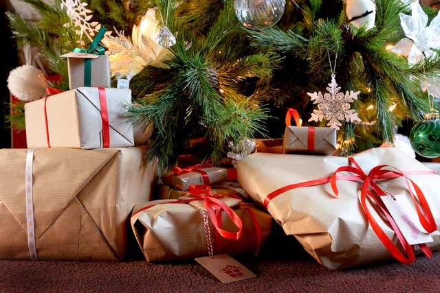 Charity shops have seen a rise in shoppers searching for second-hand Christmas gifts (Nick Ansell/PA)