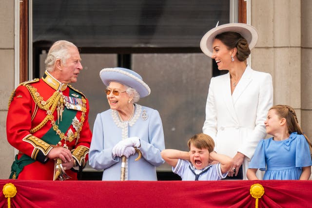 Prince Louis seems less that impressed during a flypast over Buckingham Palace after the Trooping the Colour ceremony as his great-grandmother the Queen celebrated her official birthday in June. His grandfather, mother and old sister also seemed oblivious to his complaint (Aaron Chown/PA)
