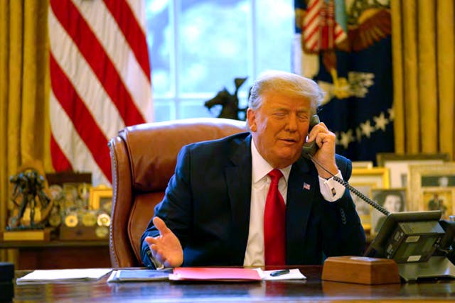 <p>Donald Trump on the phone to Mike Pence on 6 January 2021 </p>