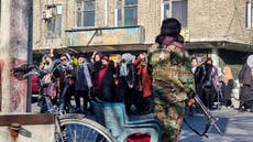 Afghan men walk out of classes to support women banned from colleges as Taliban launches misogynist defence