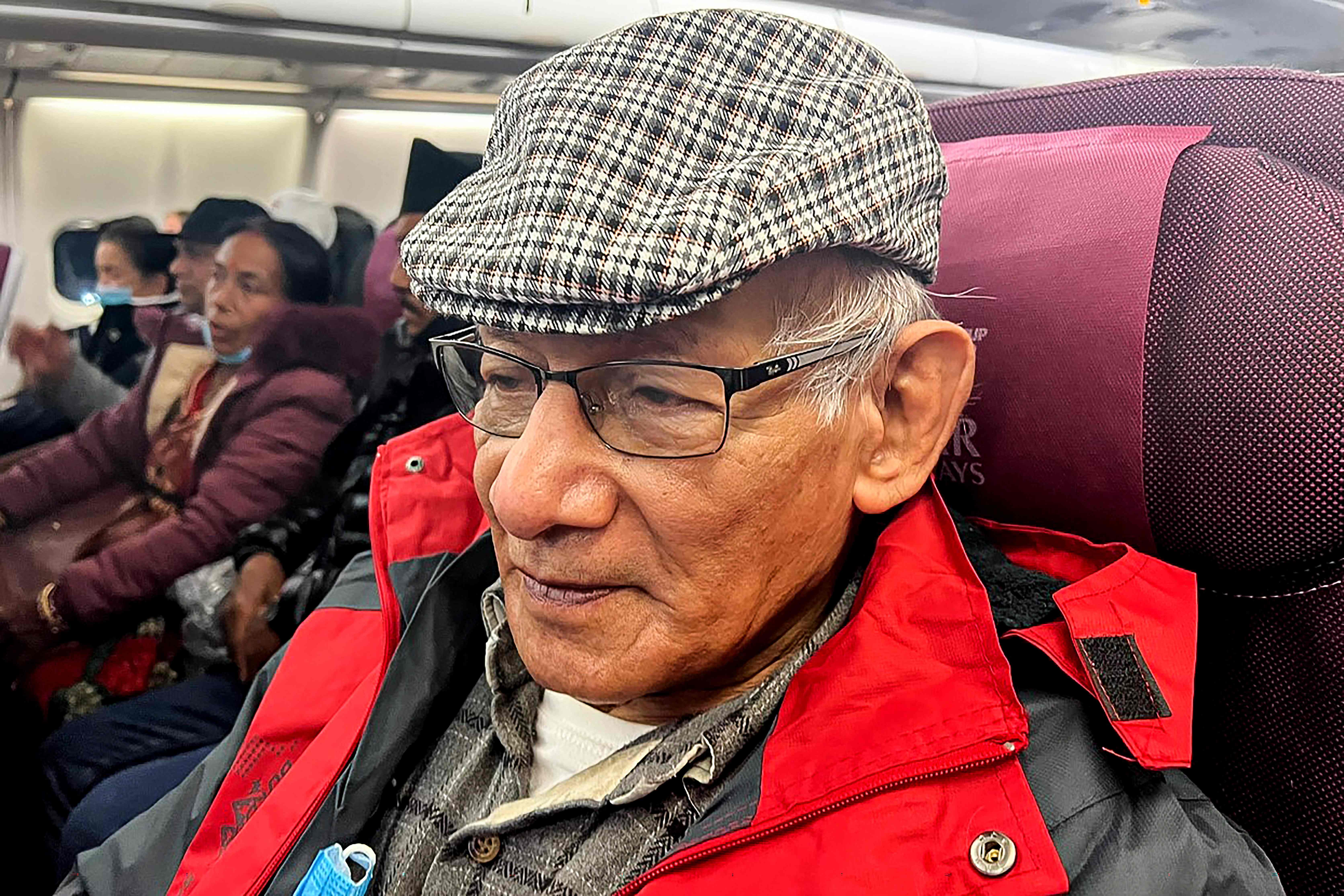 French serial killer Charles Sobhraj sits in an aircraft departing from Kathmandu to France