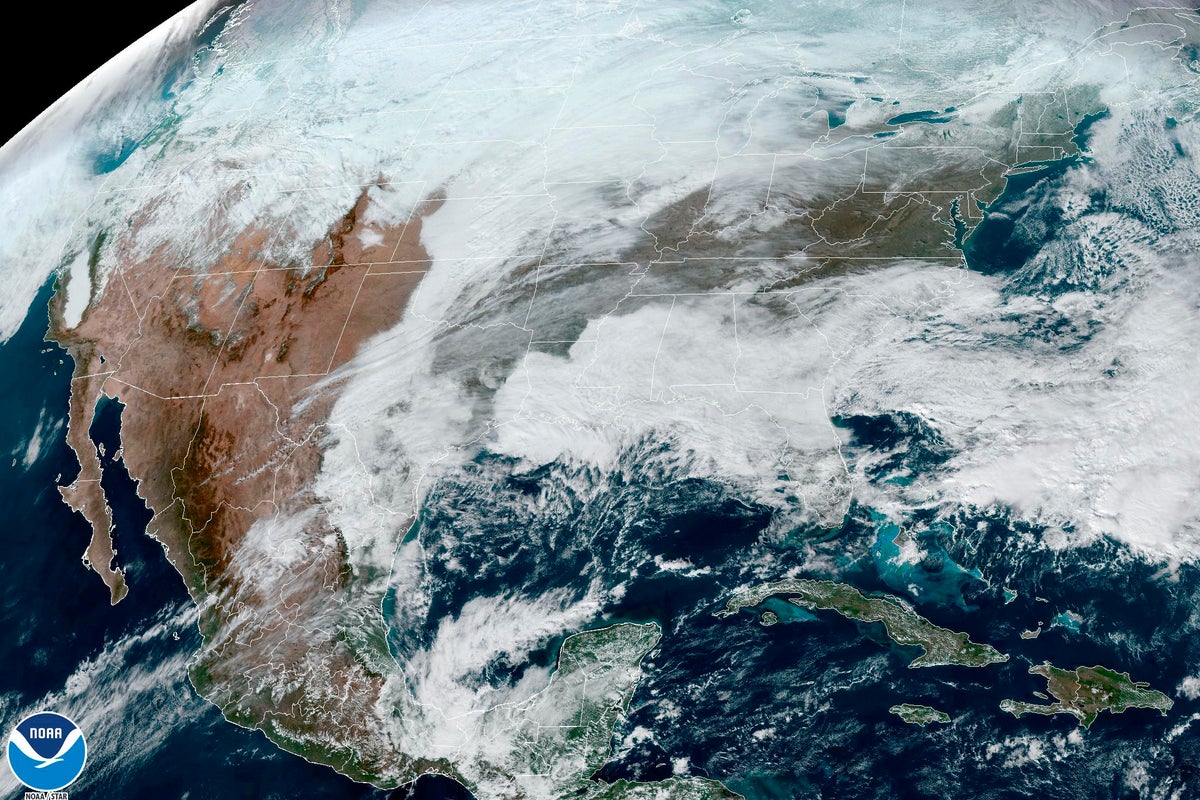 Satellite images show winter storm Elliot’s deadly path through the US