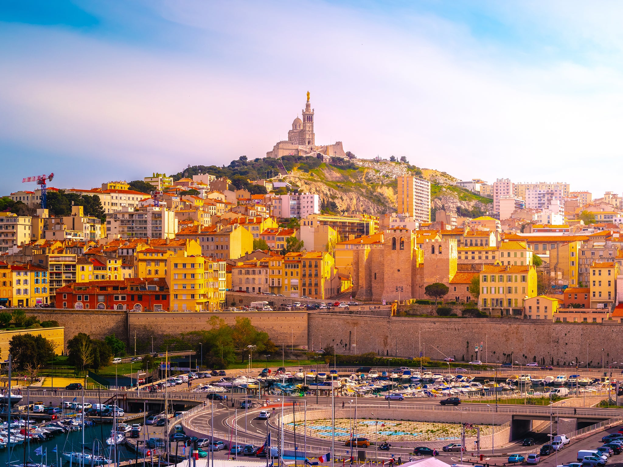 A view of Marseille with Notre-Dame de la Garde basilica on top of the hill