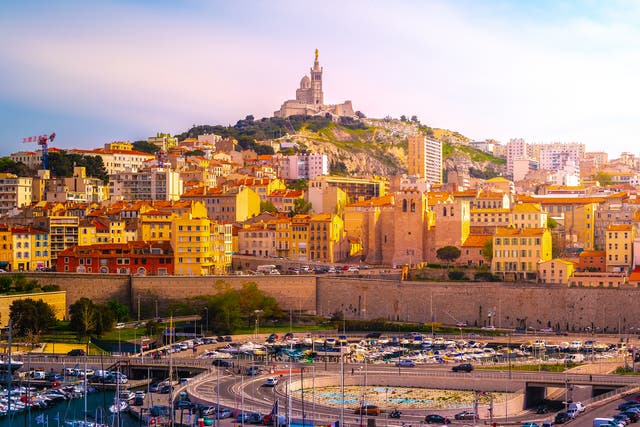 <p>A view of Marseille with Notre-Dame de la Garde basilica on top of the hill</p>