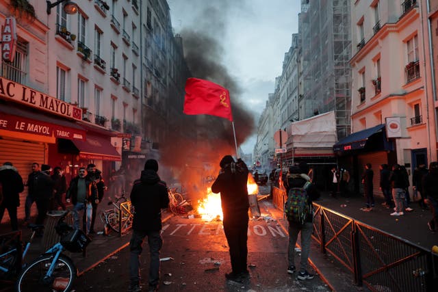 <p>Protests in the French capital on Friday evening following the gun attack </p>