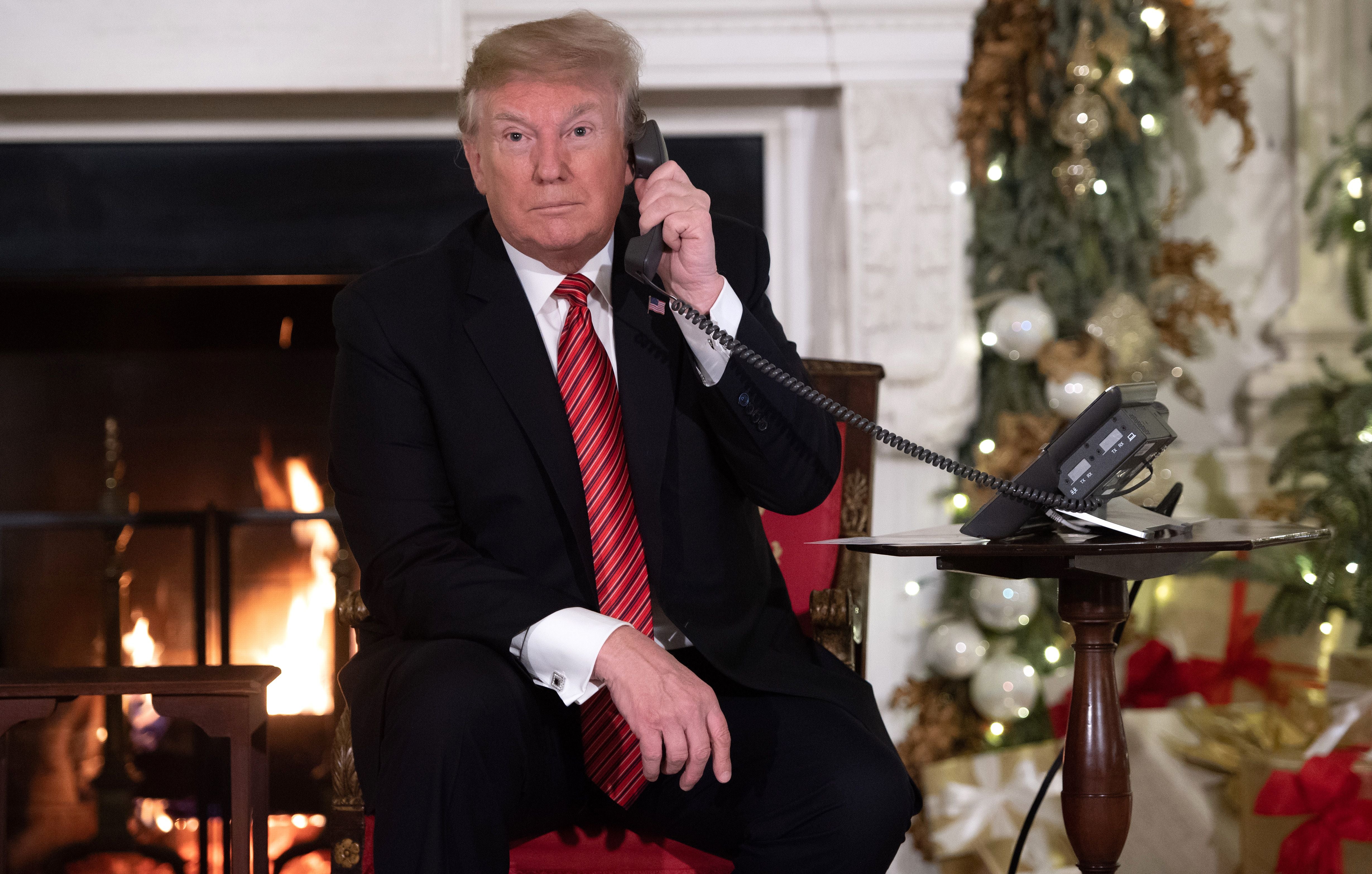 Former US president Donald Trump taking part in the Norad Santa-tracking tradition in 2018