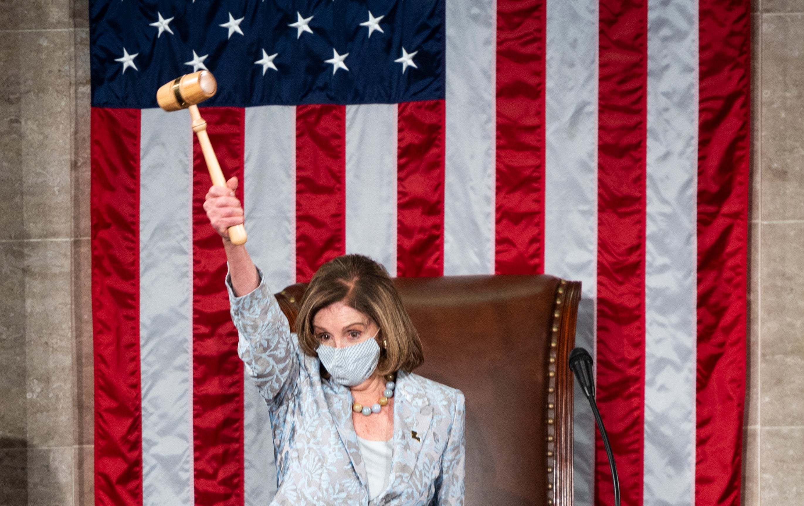Speaker of the House Nancy Pelosi of Calif., waves the gavel on the opening day of the 117th Congress on Capitol Hill in Washington, Sunday, Jan. 3, 2021