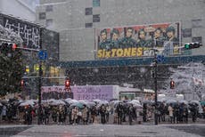 Heavy snowfall in Japan kills 13 as weather officials ask residents to stay alert for blizzards