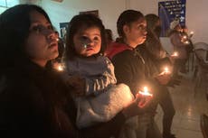 Stuck at the border, migrants find a little Christmas cheer