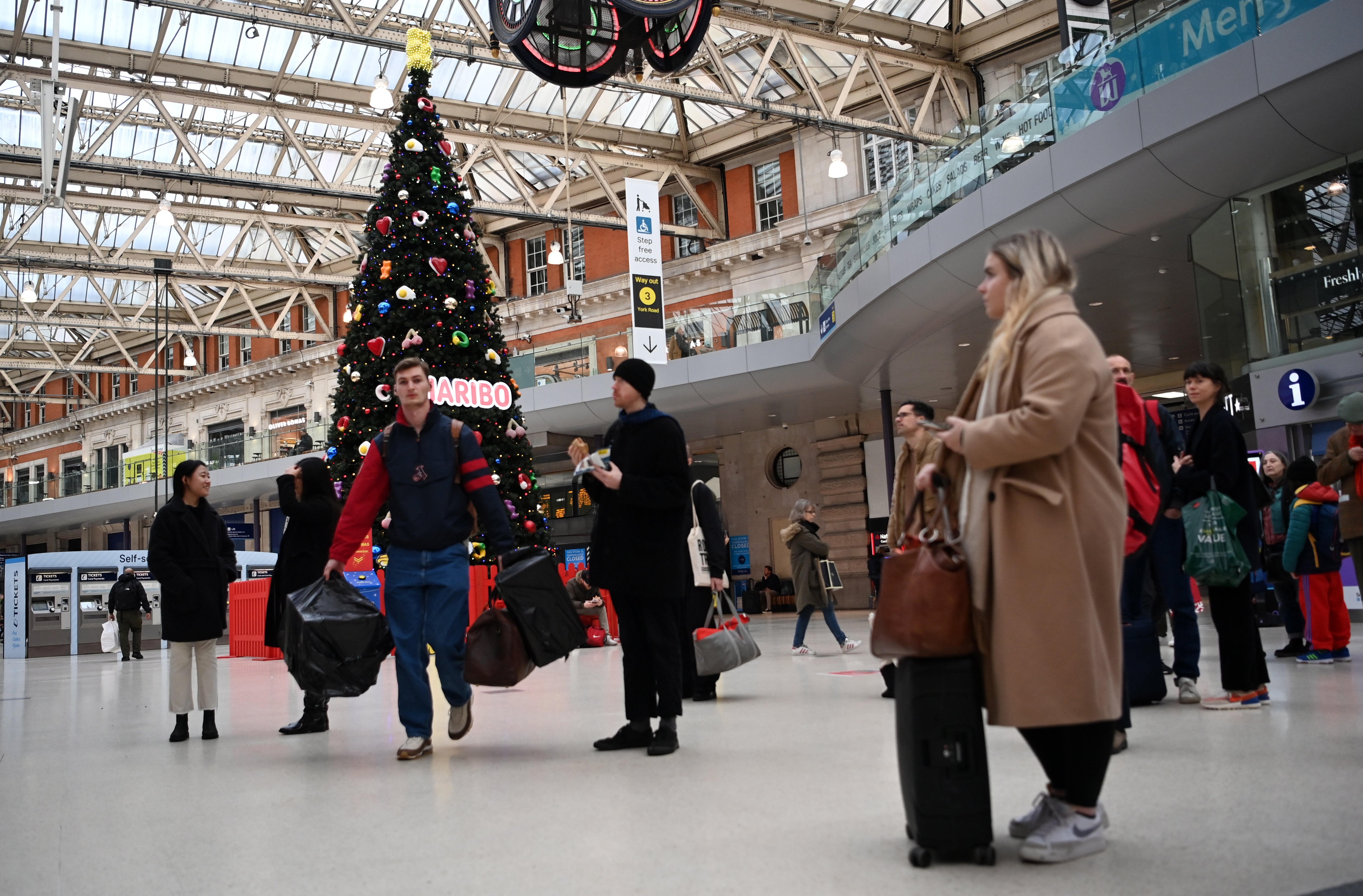 Christmas Eve commuters at Waterloo Station in London