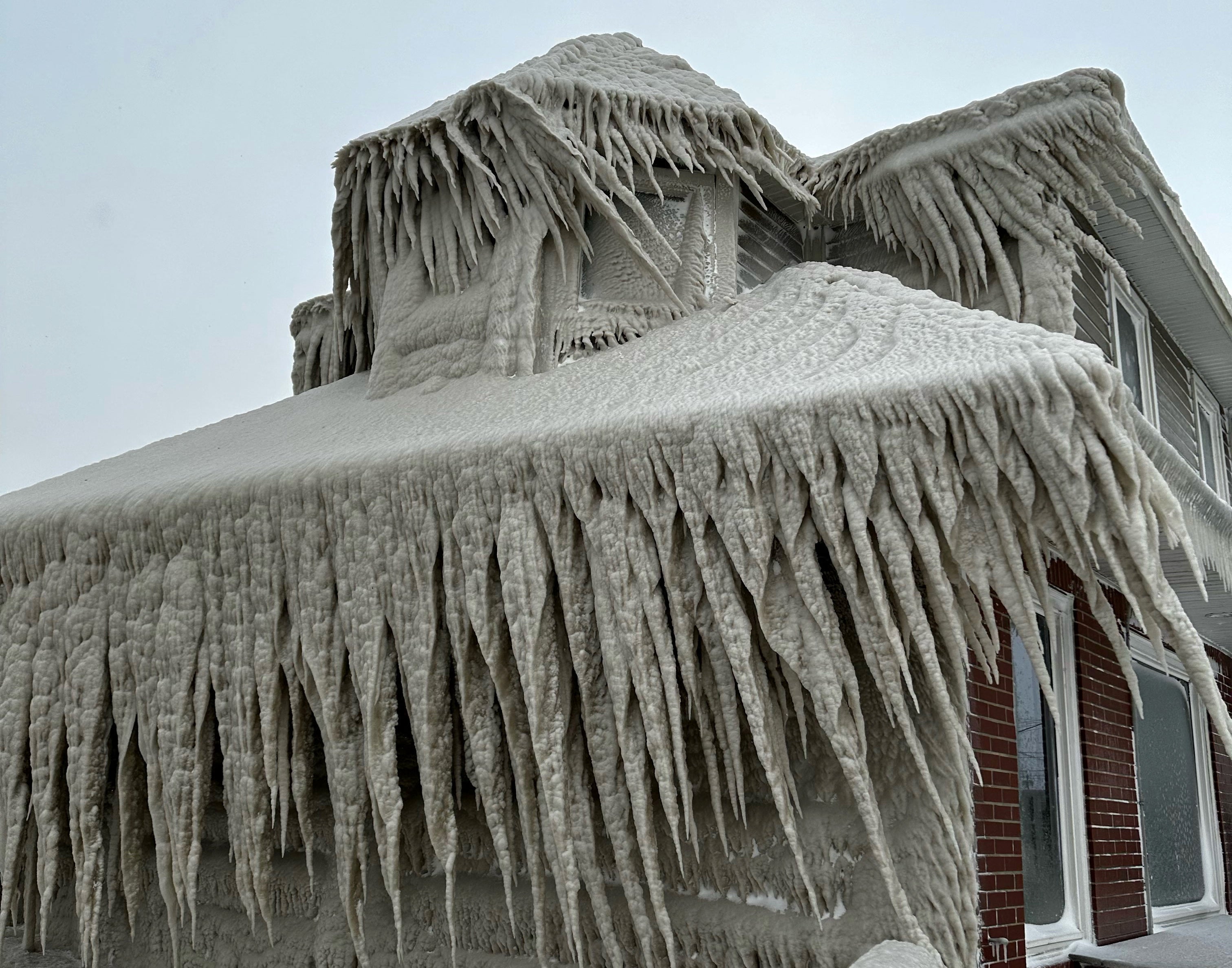 Hoak's restaurant is covered in ice from the spray of Lake Erie waves during a winter storm that hit the Buffalo region in Hamburg, New York, U.S. December 24, 2022