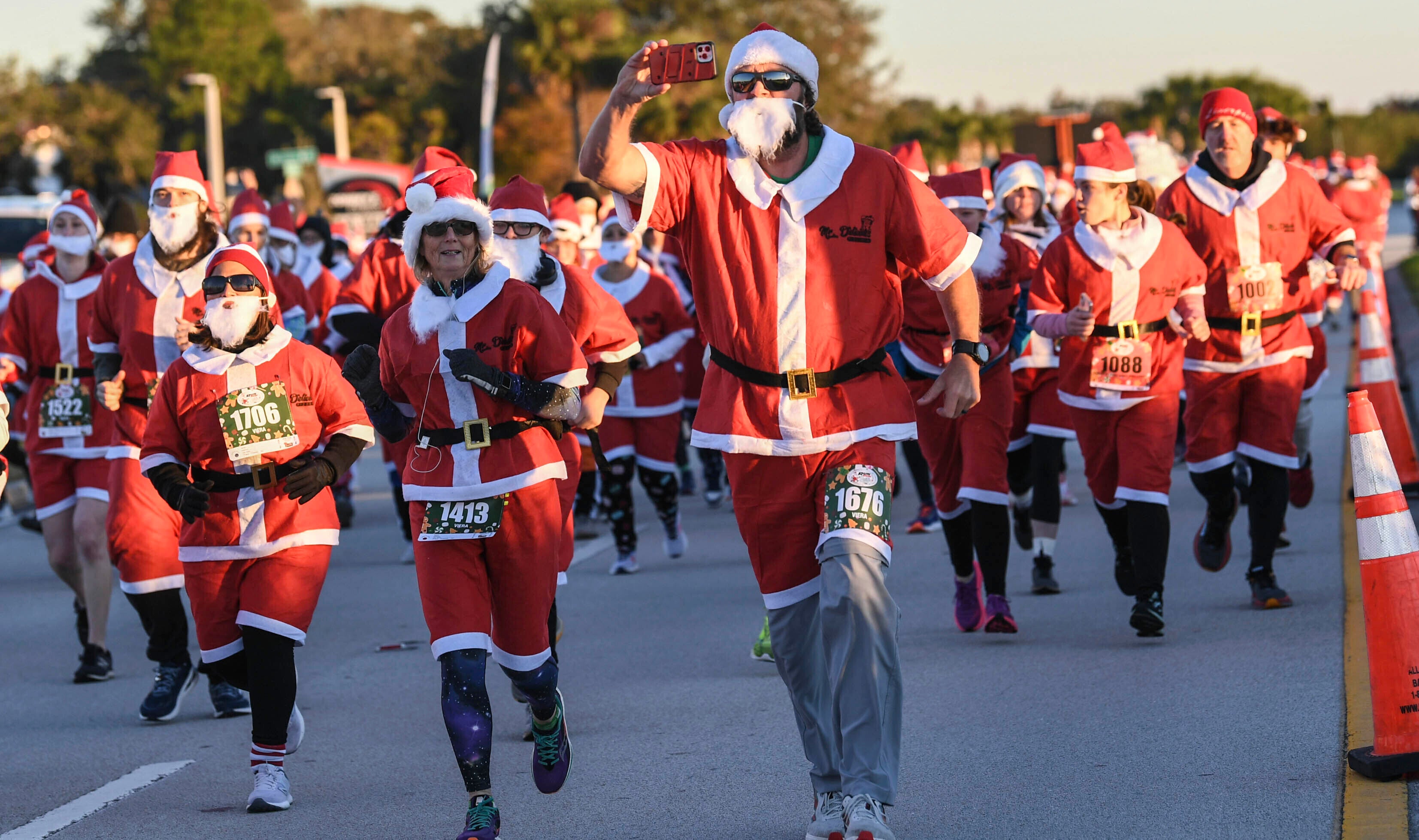 More than 800 runners dressed as Santa Claus braved near freezing temperatures to participate in the Run Run Santa 1 Mile Saturday Dec. 24, 2022 in Viera, Fla