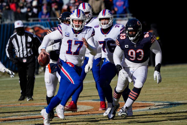 Quarterback Josh Allen (17) helped the Buffalo Bills defeat the Chicago Bears (Charles Rex Arbogast/AP)