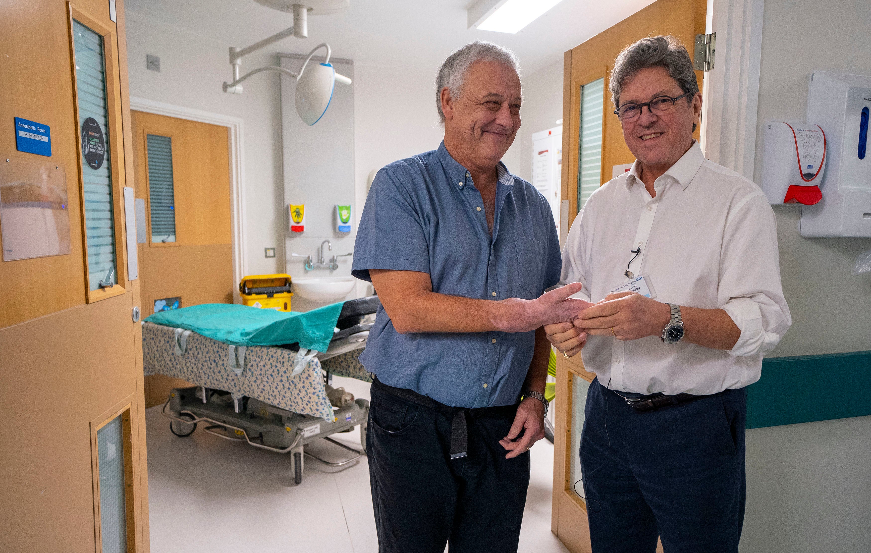 Hand transplant patient Mark Cahill with surgeon Simon Kay at Leeds General Infirmary