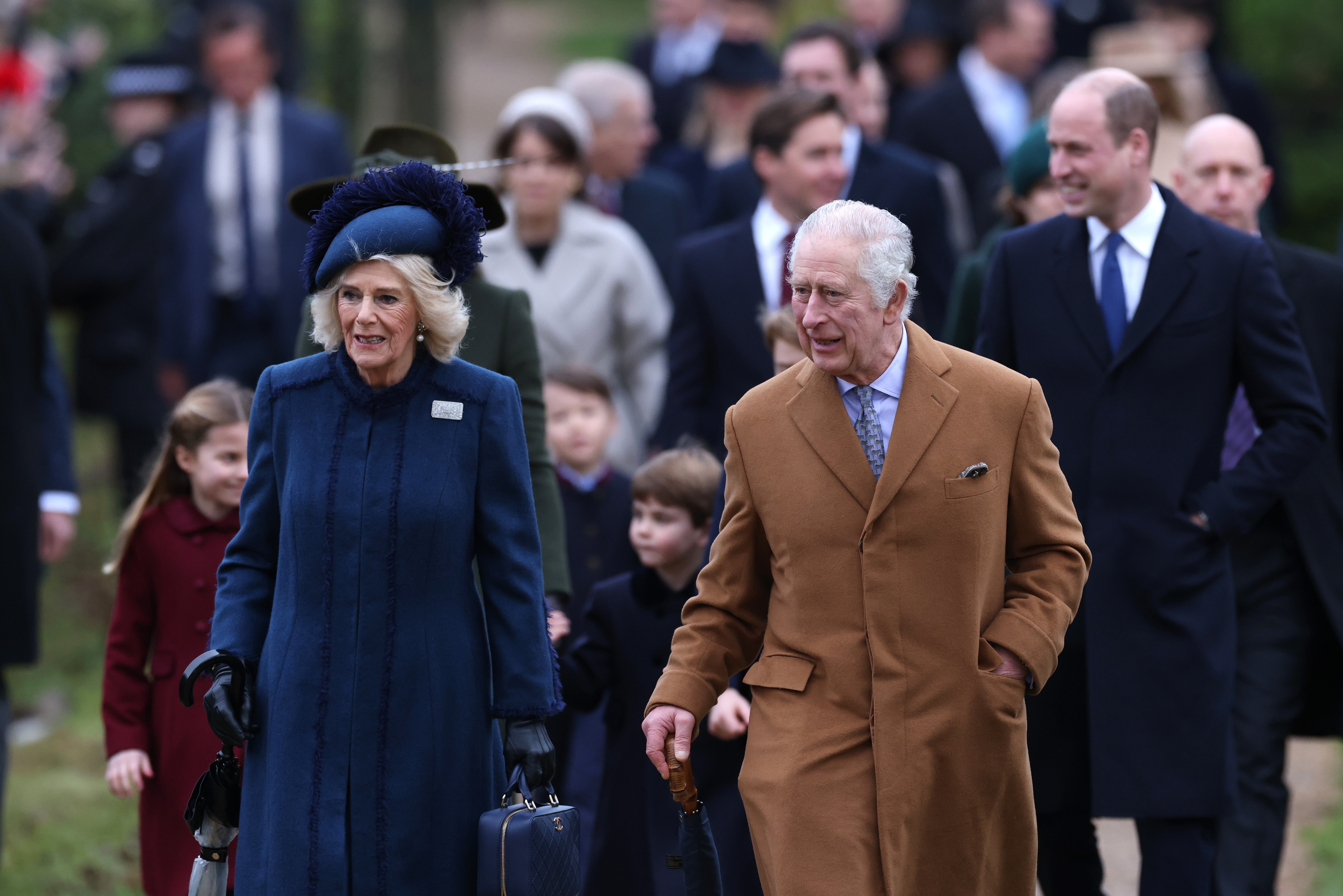 The King and Queen consort lead the family