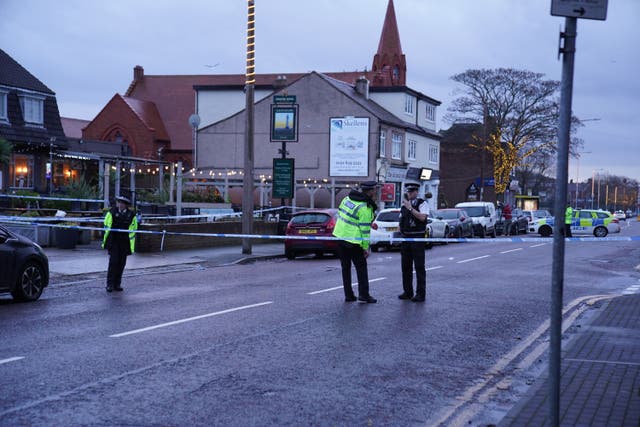 A woman died in a Christmas Eve shooting at a pub in Wallasey Village, Merseyside (Peter Byrne/PA)
