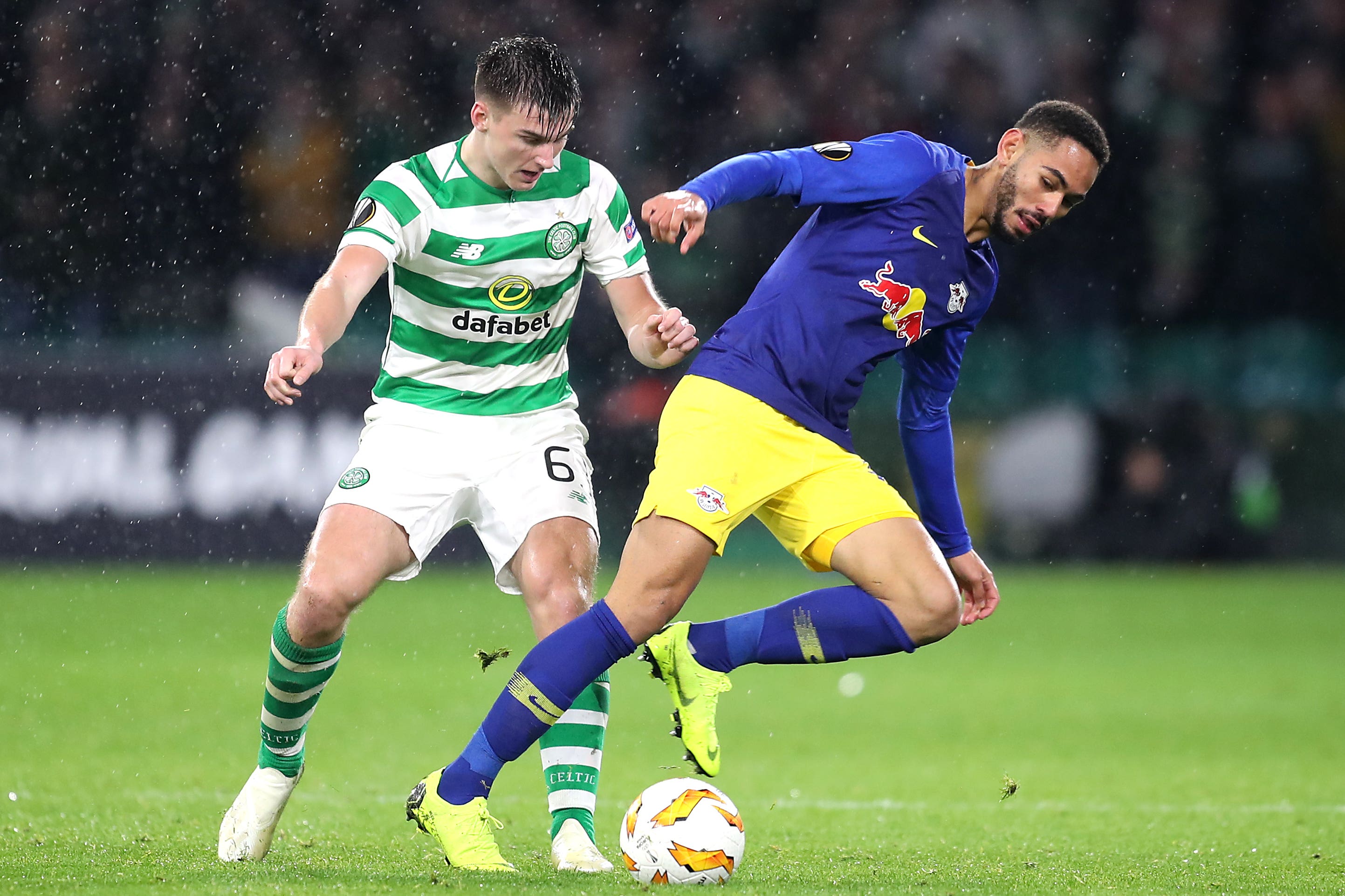 Celtic’s Kieran Tierney (left) and RB Leipzig’ Matheus Cunha battle for the ball during the UEFA Europa League, Group B match at Celtic Park, Glasgow.