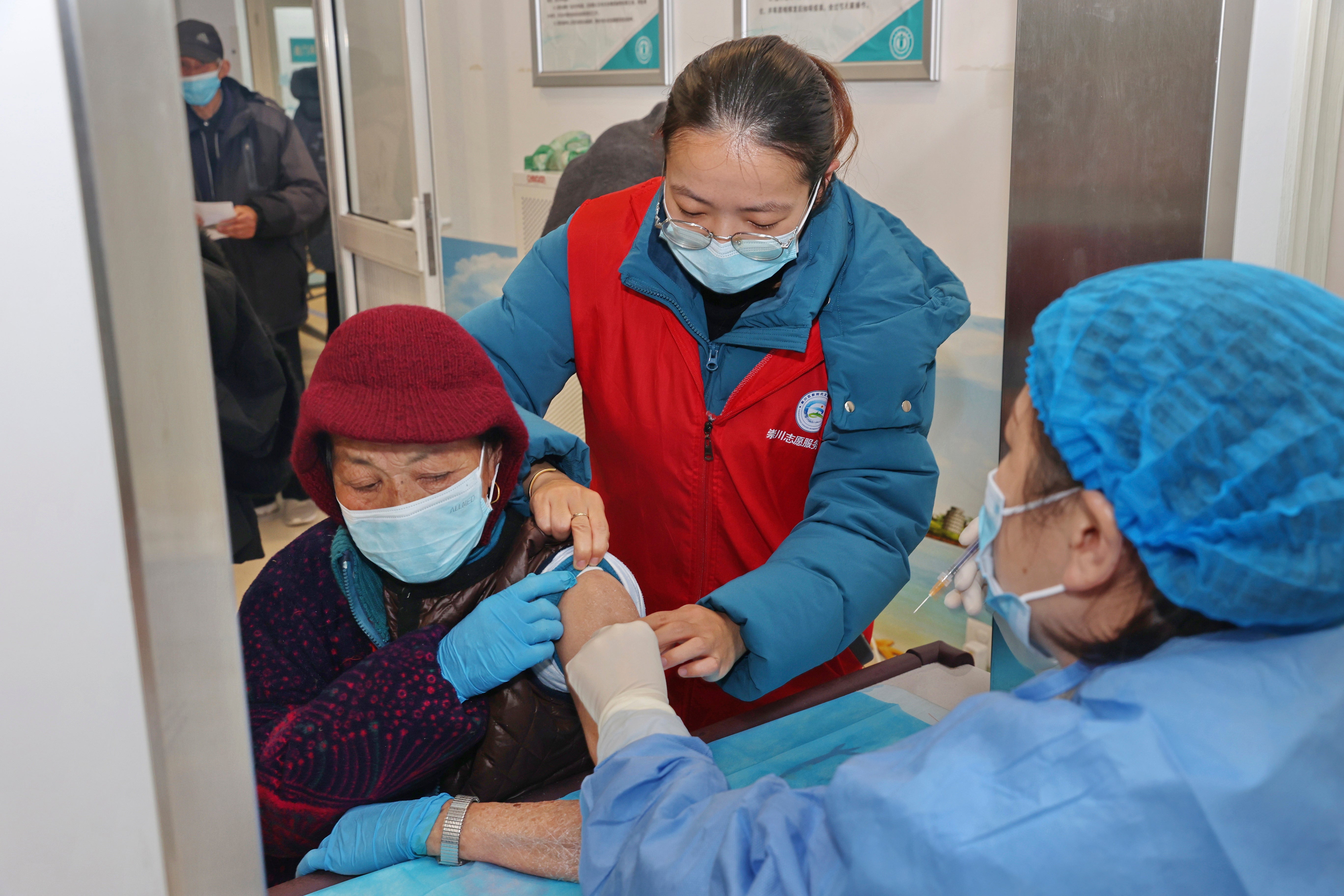 Virus Outbreak China Vaccinating the Elderly