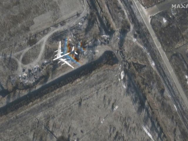 <p>A satellite image shows bomber in flight at northeast of Engels Air Base in Saratov on 3 December</p>