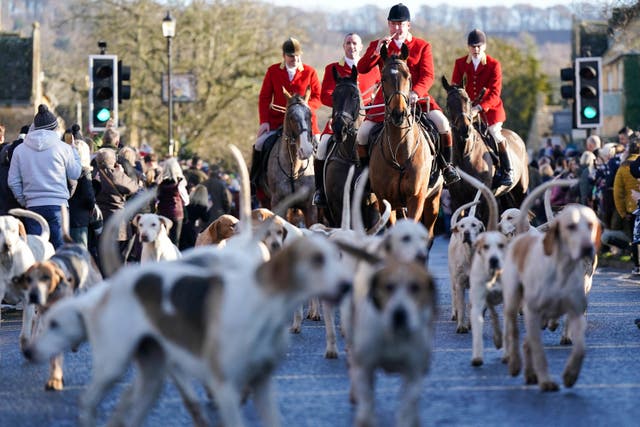 Riders and hounds during the annual North Cotswold Boxing Day hunt in Broadway, Worcestershire (Jacob King/PA)
