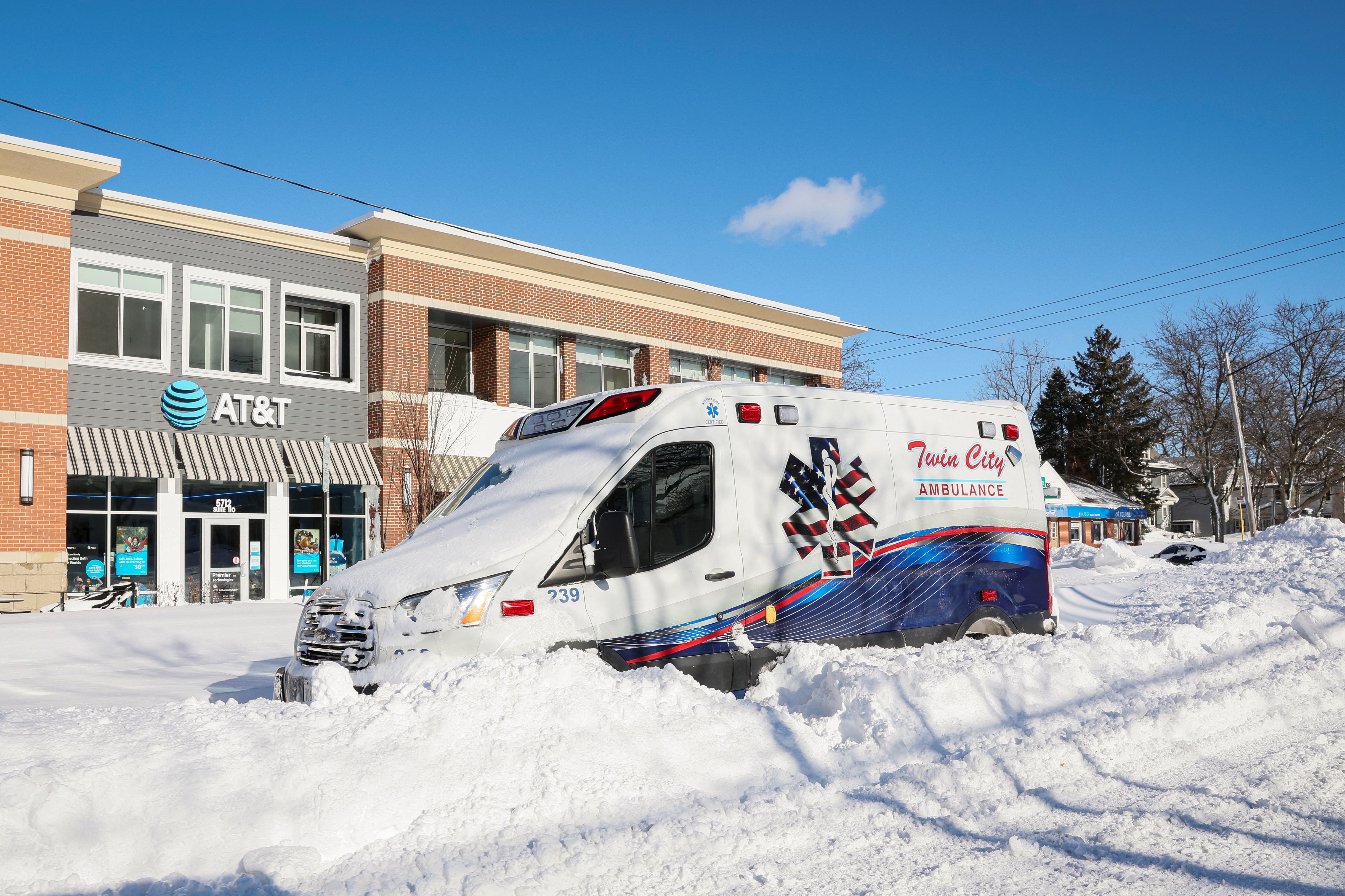 An Ambulance is left stranded on the road following a winter storm that hit the Buffalo region on Main St. in Amherst, New York