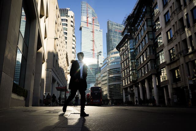 The number of big takeovers and mergers involving UK-listed companies nearly halved this year as investors were deterred by market volatility, political instability, and recession fears (James Manning/ PA)
