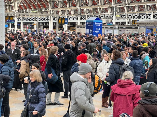 <p>Going nowhere: Passengers at London Paddington station as post-strike cancellations began</p>