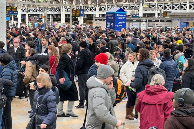 <p>Going nowhere: Passengers at London Paddington station as post-strike cancellations began</p>