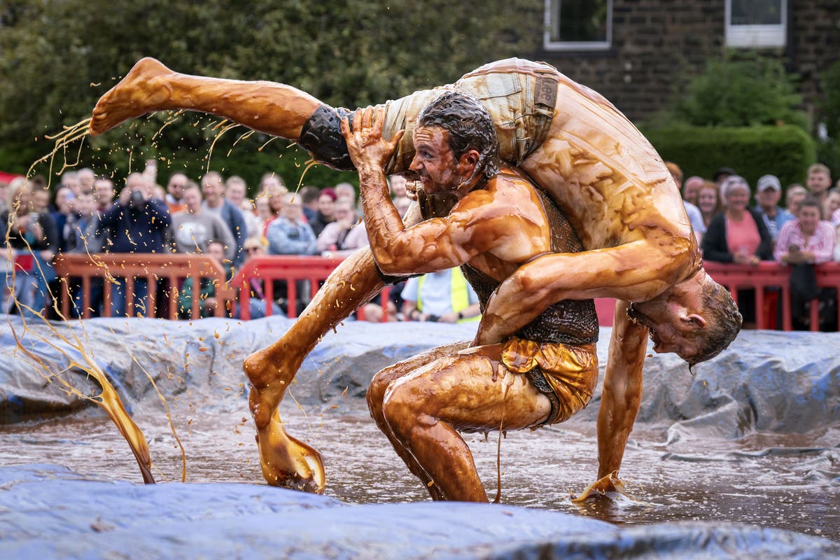 In Pictures: Gravy wrestling and bog snorkelling – the quirkier events of 2022 In Pictures: Gravy wrestling and bog snorkelling – the quirkier events of 2022