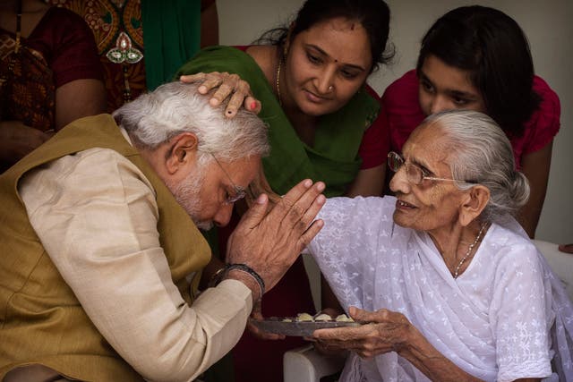<p>File photo: Narendra Modi with his mother Heeraben Modi on 16 May 2014 in Ahmedabad, India</p>