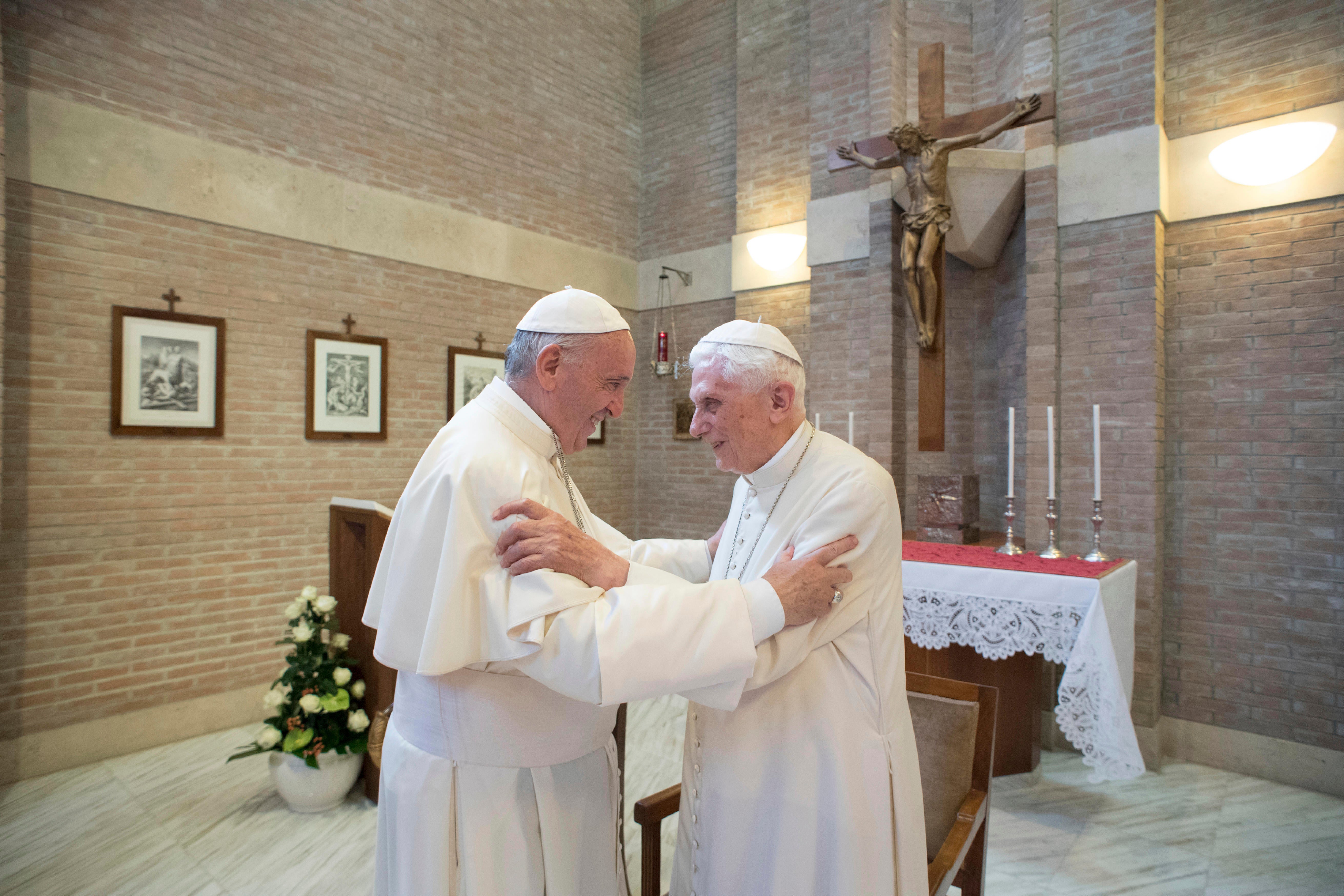 Former pope Benedict with Pope Francis