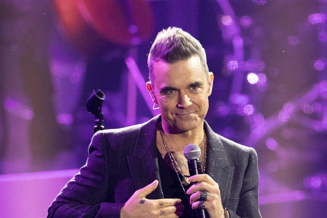 <p>Robbie Williams</p>