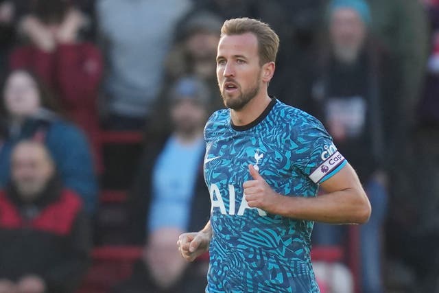 Tottenham’s Harry Kane celebrates after scoring his side’s first goal during the English Premier League soccer match between Brentford and Tottenham Hotspur at the Gtech Community Stadium in London, Monday, Dec. 26, 2022. (AP Photo/Kirsty Wigglesworth)
