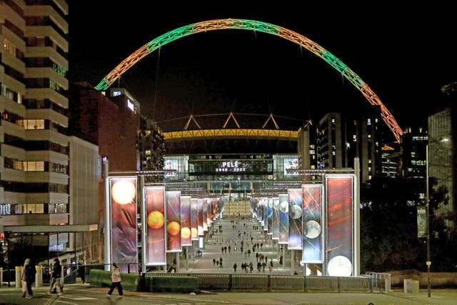 <p>The FA lit up the Wembley arches in tribute to Pele </p>