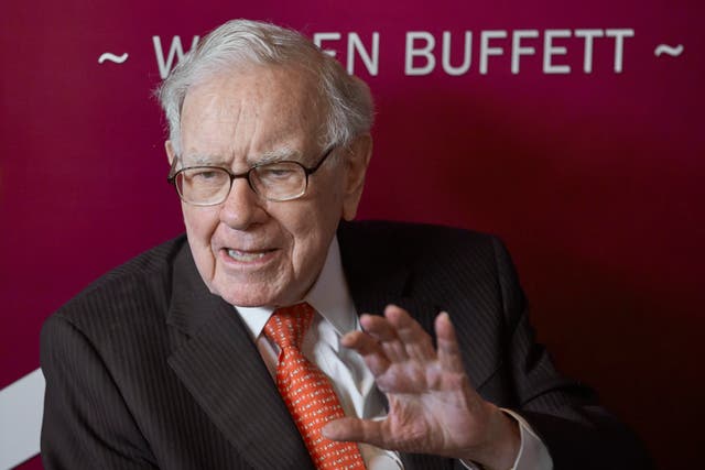 <p>File photo: Warren Buffett, chairman and CEO of Berkshire Hathaway, speaks during a game of bridge following the annual Berkshire Hathaway shareholders meeting in 2019 </p>