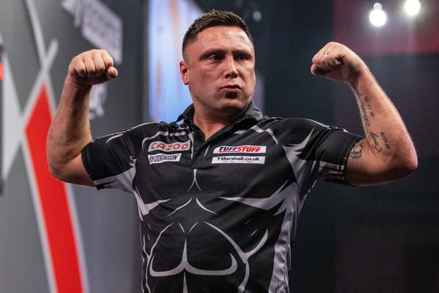 Gerwyn Price became the first place to reach the quarter-finals at Alexandra Palace (Steven Paston/PA)