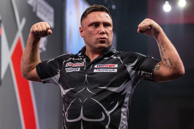 Gerwyn Price became the first place to reach the quarter-finals at Alexandra Palace (Steven Paston/PA)