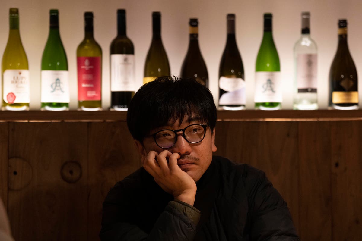 China faces bumpy road to normal as infections surge