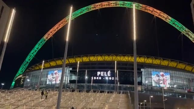 <p>Wembley Stadium lights up with Brazil's national colours in tribute to Pele</p>