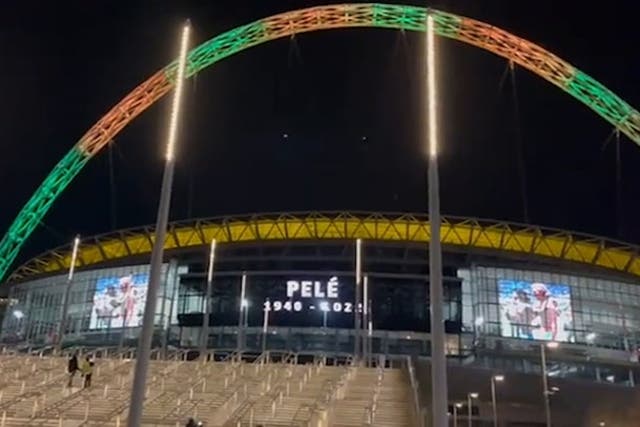 <p>Wembley Stadium lights up with Brazil's national colours in tribute to Pele</p>