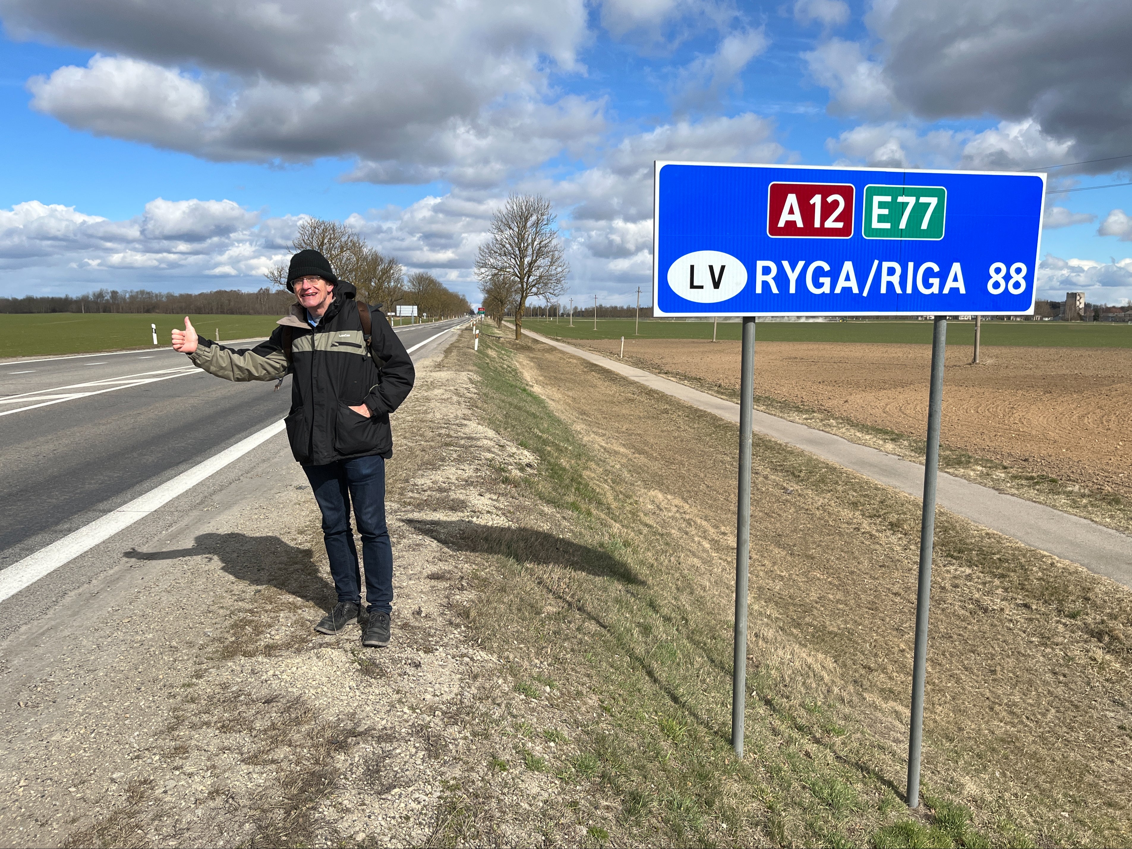Dodgy character: vainly hitchhiking on the E77 highway from Lithuania towards Riga