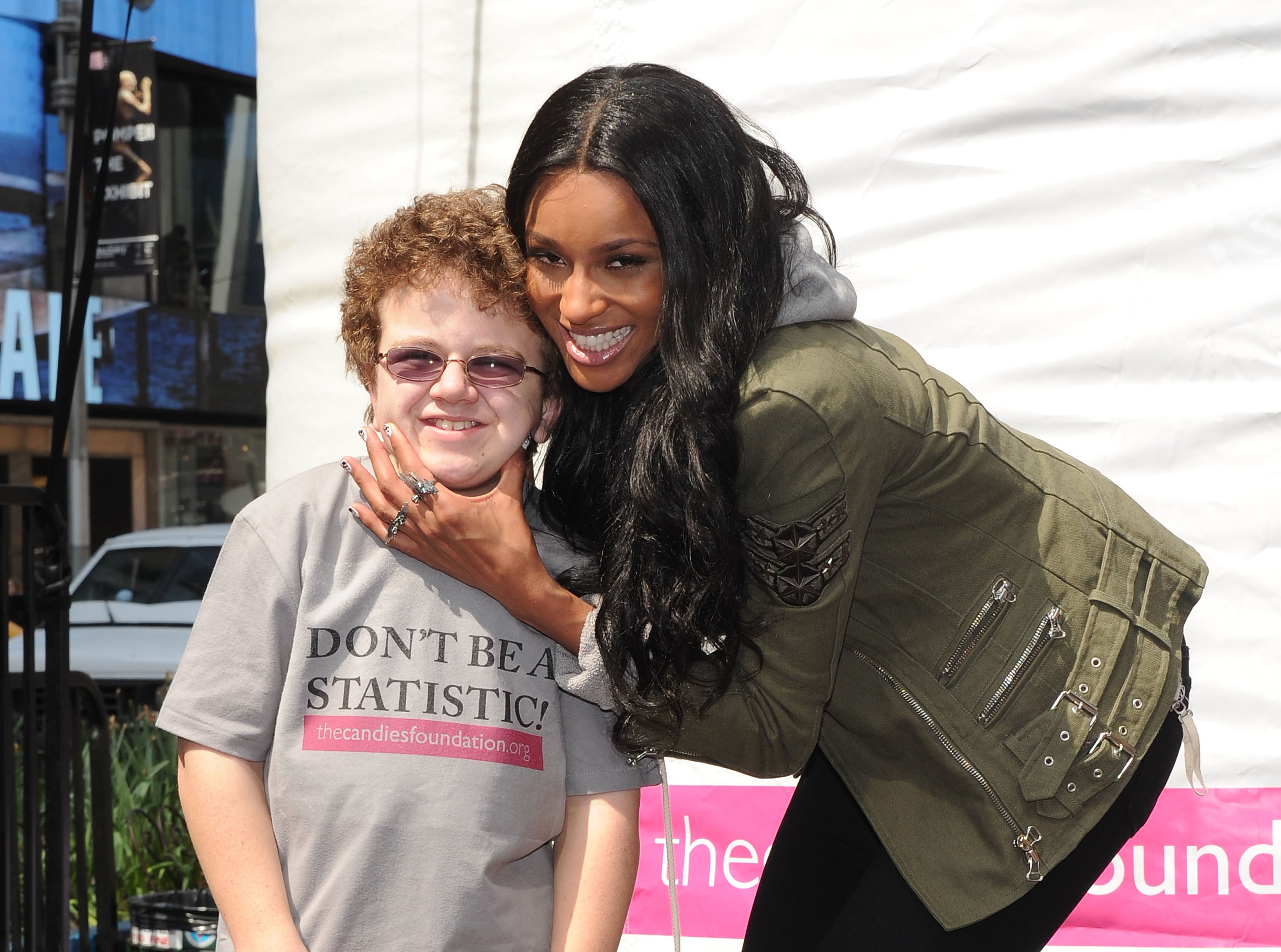 Keenan Cahill poses with pop star Ciara in 2011