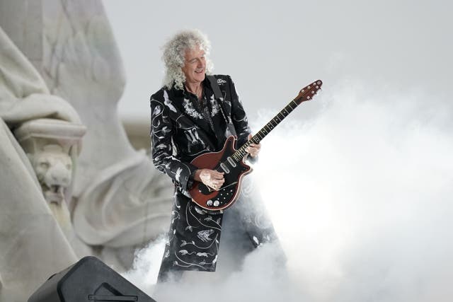 Queen guitarist Brian May has been given a knighthood for services to music and to charity (Aaron Chown/PA)