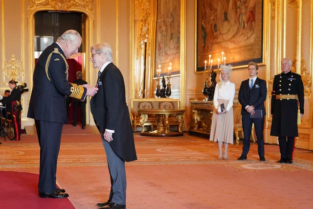 Coronation Street star Bill Roache is made Officer of the Order of the British Empire by the King at Windsor Castle (PA)