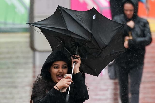 Rain, snow and ice could be unwelcome guests at New Year celebrations across the UK after a number of weather warnings were issued (Jacob King/PA)