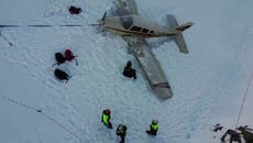 Pilot and passengers rescued after plane makes emergency landing on Italian mountain