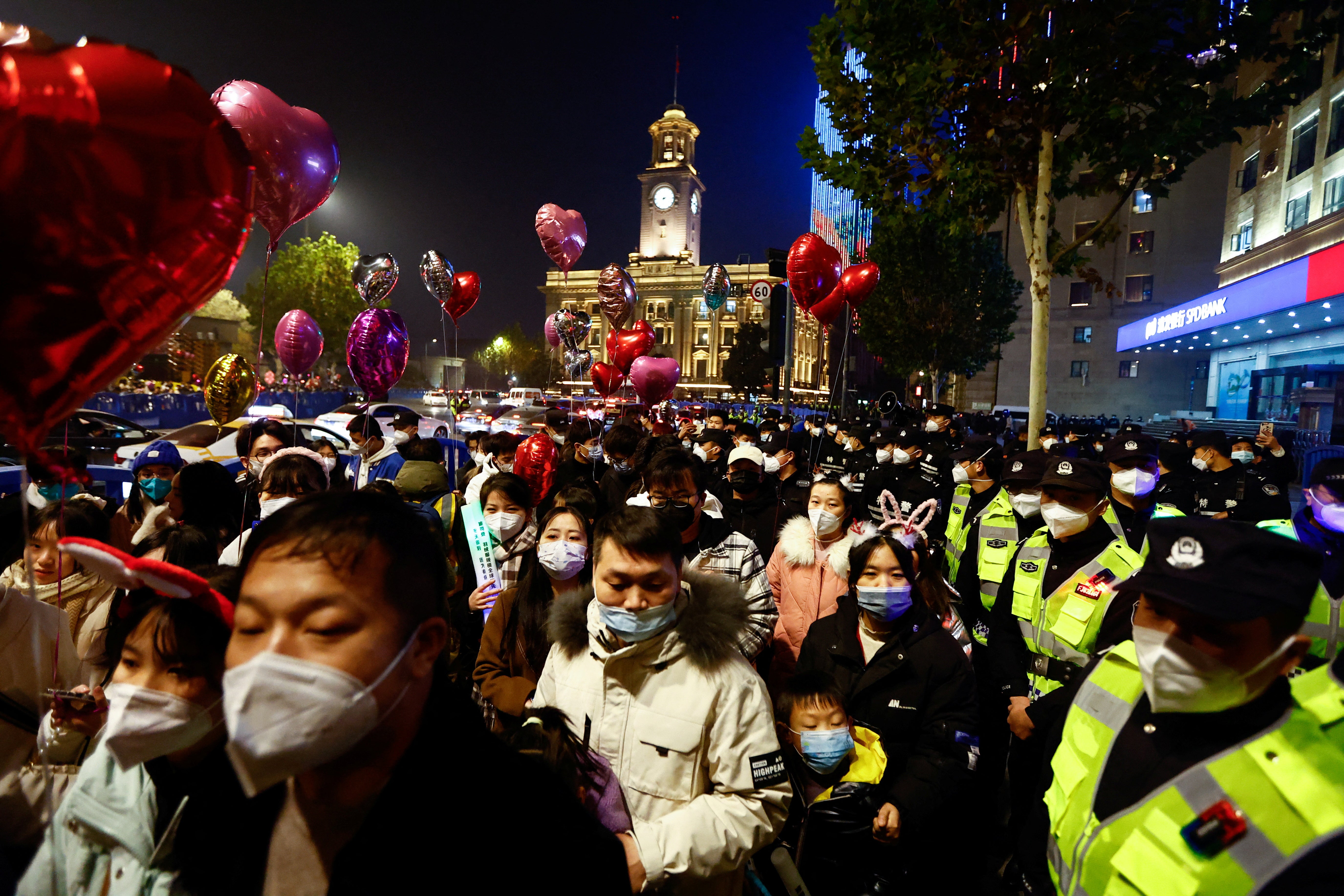 Despite soaring Covid rates, residents in Wuhan gathered to watch the fireworks as they welcomed a new year